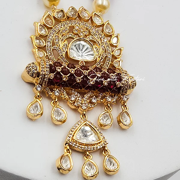 Aarohi Emerald Kundan Necklace Set with Pearl Drops - Image 2